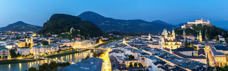 Panorama Beautiful view of the historic city of Salzburger Land, Austria at duskの写真素材
