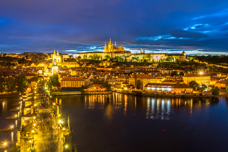 Pargue at dusk, view of the Lesser Bridge Tower of Charles Bridge Karluv Most and Prague Castle, Czech Republic.のeditorial素材
