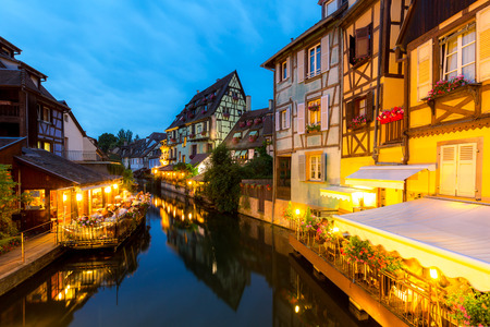 Colmar, Petit Venice, at dusk water canal and traditional colorful houses. Alsace, France.の写真素材