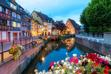 Colmar, Petit Venice, at dusk water canal and traditional colorful houses. Alsace, France.の写真素材