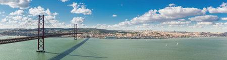 Panorama of Lisbon cityscape with 25 de Abril suspension Bridge, Portugal