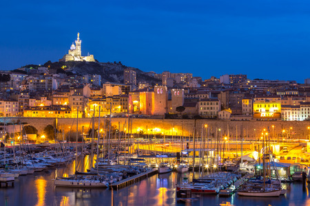 Marseille, France at night. The famous european harbour view on the Notre Dame de la Gardeの写真素材