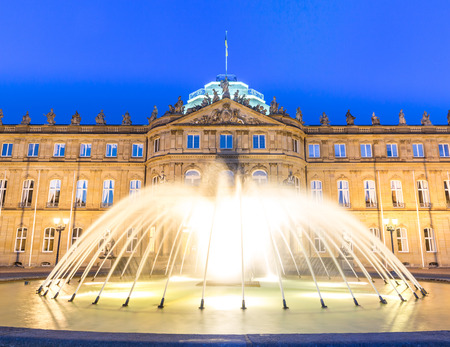 Fountain at neues Schloss New palace in Stuttgart city center, Germany at duskのeditorial素材