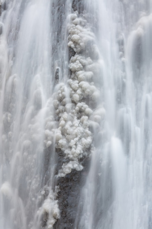 Snow at Fukuroda Falls Waterfall in Ibaraki Japan Winterの写真素材
