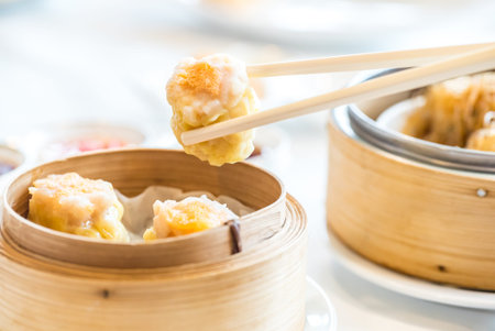 Chinese dim sum Shumai - Steamed Chinese groumet cuisine