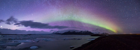 The Northern Light Aurora borealis at Jokulsarlon Glacier Lagoon Iceland Panoramaの写真素材