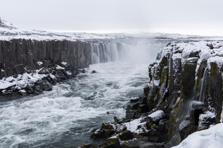 Iceland Selfoss Waterfall in winter with snowの写真素材