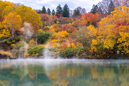 Autumn Forest onsen lake at Jigoku Numa, Hakkoda Aomori Tohoku Japanの写真素材
