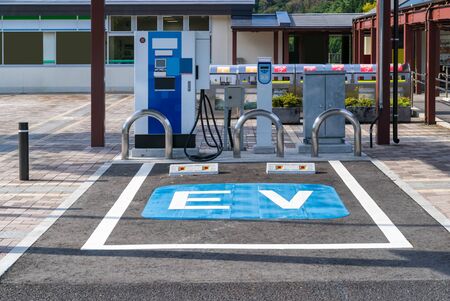 EV Station Charger for electrical vehicle car using as green environmental conceptの写真素材