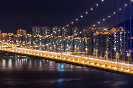 Sunset and light illumination of Tsing ma bridge landmark suspension bridge in Tsing yi area of Hong Kong China.の写真素材