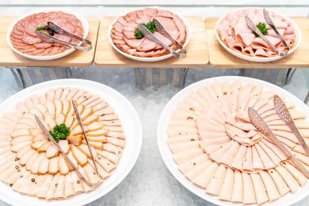Variety of Cold cut, ham pork beef salami and sausage, for salad station in buffet lineの写真素材