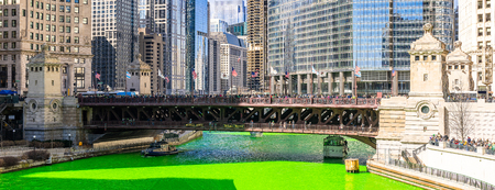 Chicago, IL - Mar 16, 2019: The annual Chicago St. Patrick's Day tradition of dying the Chicago river green in Chicago downtone on Mar 16,2019. This has been organized by the local Plumbers Union since 1962.のeditorial素材