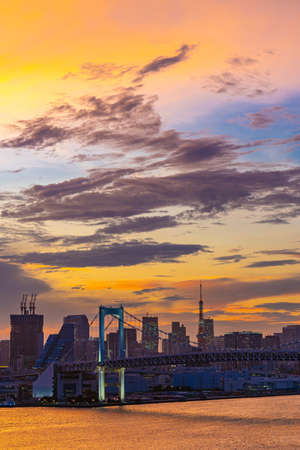 Aerial view of Tokyo skylines with Rainbow bridge and tokyo tower over Tokyo bay Sunset Twilight from Odaiba in Tokyo city Kanto Japan.のeditorial素材