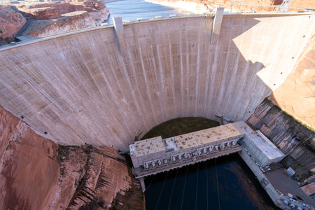 Glen Canyon Dam with Lake Powell in the Desert rural area of Page city Arizona, United States. USA...