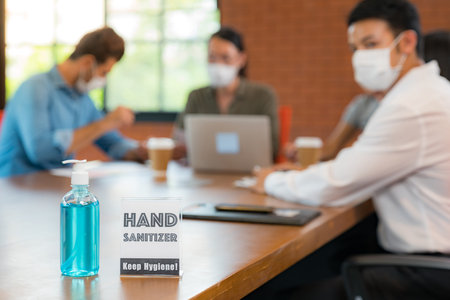 Signage of Hand sanitizer alcohol gel in meeting room
