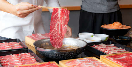 Cooking of japanese wagyu beef Shabu Shabu set hot potの写真素材