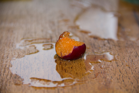 Biting fruitの写真素材