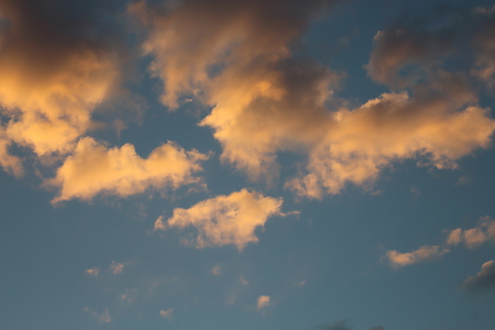 Blue sky and red cloudsの写真素材