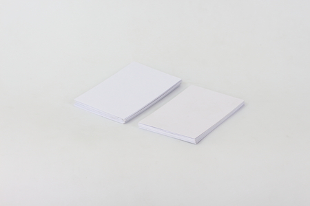 White business card on a white background.の写真素材