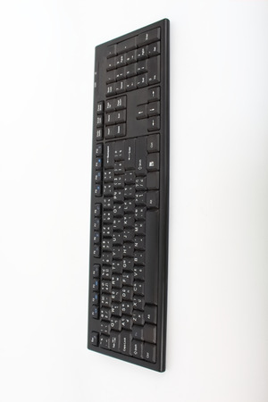 Wireless Keyboard black on a white background.の写真素材