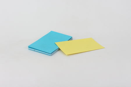 Business cards, yellow and blue on a white background.の写真素材