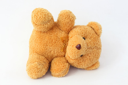 Brown teddy bear on a white background.の写真素材