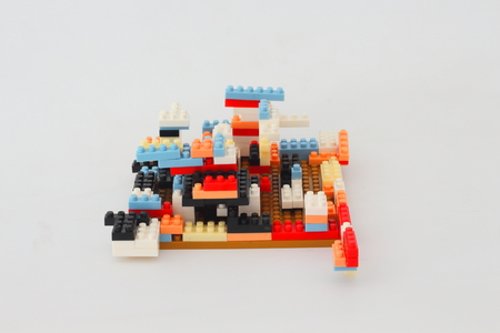 Plastic multi-colored jigsaw puzzle assembled by the idea.の写真素材