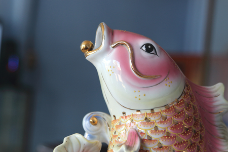 Beautiful fish statue made of ceramicの写真素材