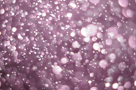 Beautiful and blurry bokeh on a pink background.の写真素材