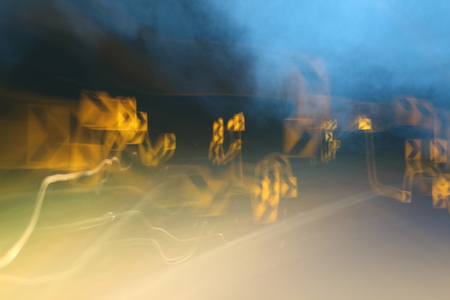 Car lights on the streets at night and blurry.の写真素材