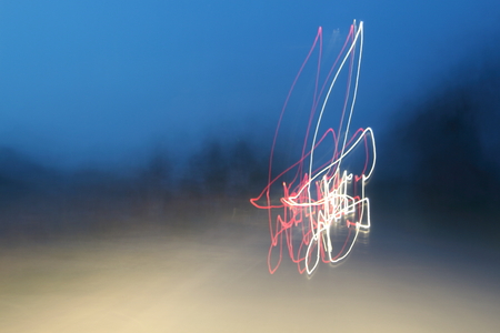 Car lights on the streets at night and blurry.の写真素材