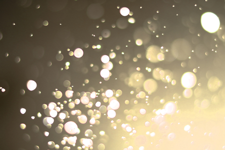Beautiful bokeh and blurry on a gold background.の写真素材