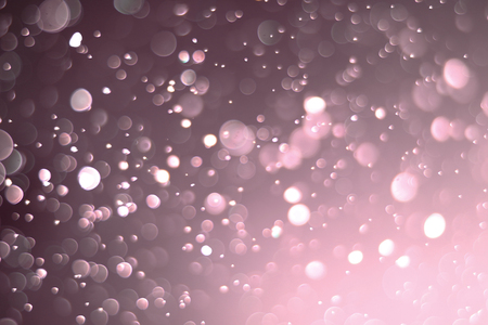 Beautiful and blurry bokeh on a pink background.の写真素材