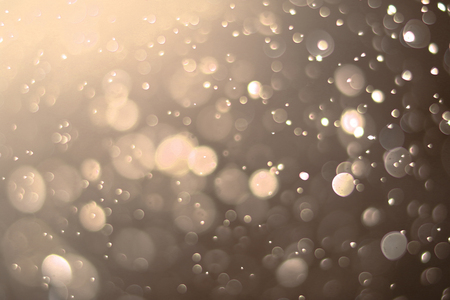 Beautiful bokeh and blurry on a gold background.の写真素材