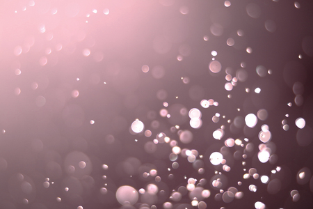Beautiful and blurry bokeh on a pink background.の写真素材