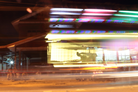 Car light and sound at night and blurry.の写真素材
