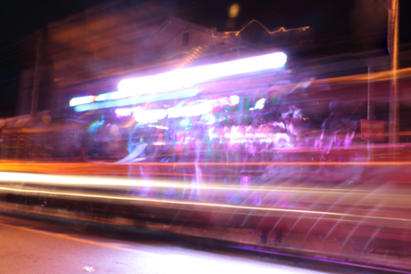Car light and sound at night and blurry.の写真素材
