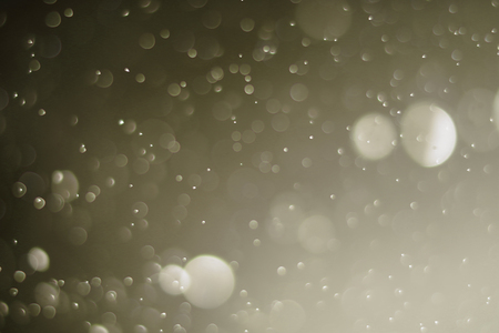 Beautiful bokeh and blurry on a gold background.の写真素材