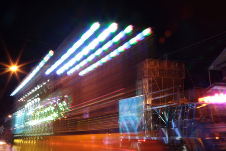 Car light and sound at night and blurry.の写真素材