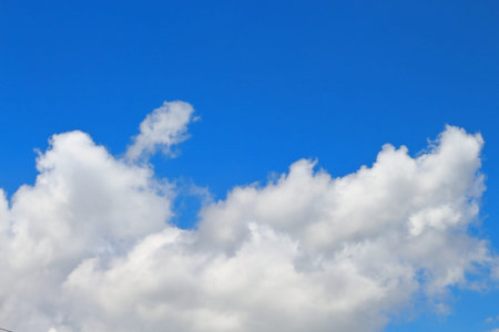 Blue skies and white clouds are beautifully patterned.の写真素材