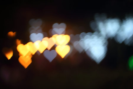 Light, beautiful bokeh heart shaped and blur at night.の写真素材