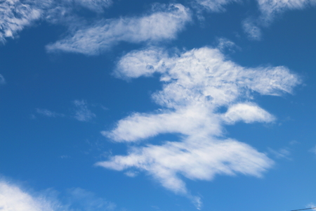 Blue skies and white clouds are beautifully patterned.の写真素材