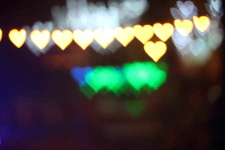 Light, beautiful bokeh heart shaped and blur at night.の写真素材