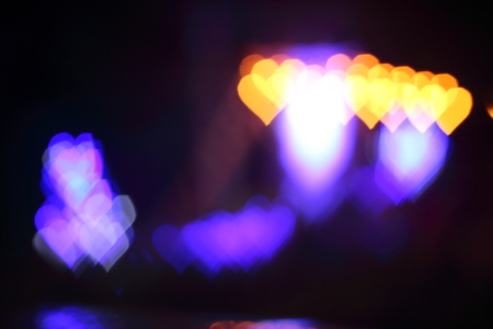 Light, beautiful bokeh heart shaped and blur at night.の写真素材