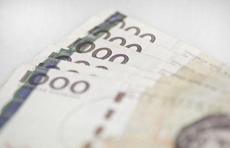 Closeup of some swedish 1000 bills on white background