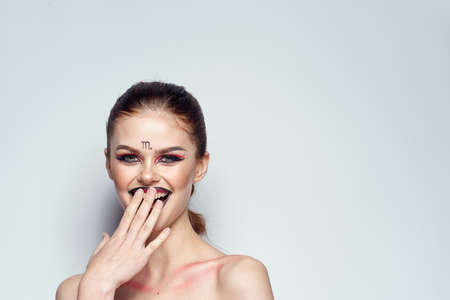 pretty woman Scorpion fashion glamor hairstyle isolated backgroundの写真素材