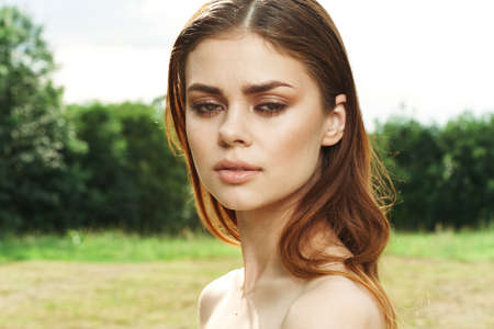 portrait of a woman Cosmetology nature green leaves glamor close-upの写真素材