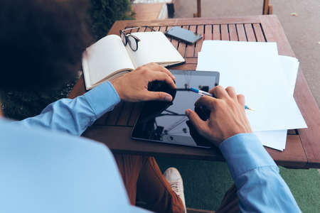 documents communication work lifestyle in a cafeの写真素材