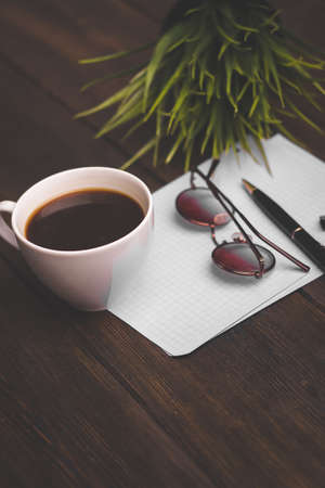 coffee cup notepad with pen learning desk officeの写真素材