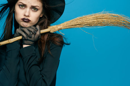 woman in witch costume metal home halloween holidayの写真素材